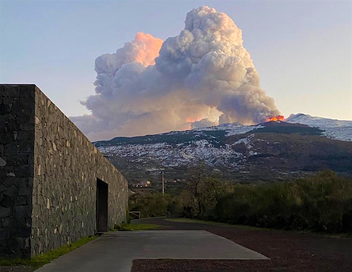 View of Mt. Etna erupting from Planeta winery